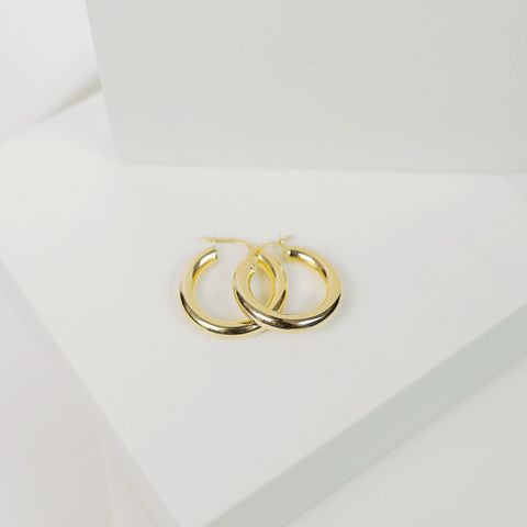 Gold huggie earrings