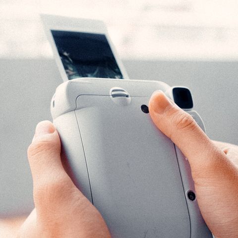 Instant camera with film