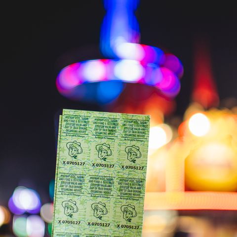 Concert or event tickets, boxed for the reveal